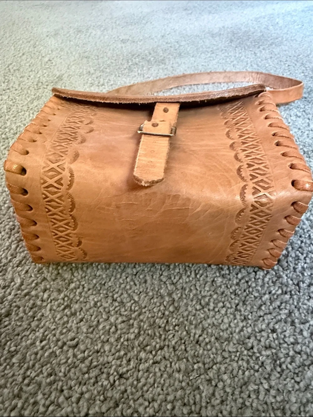 Vintage Tooled Leather Crossbody Bag with Buckle Front.